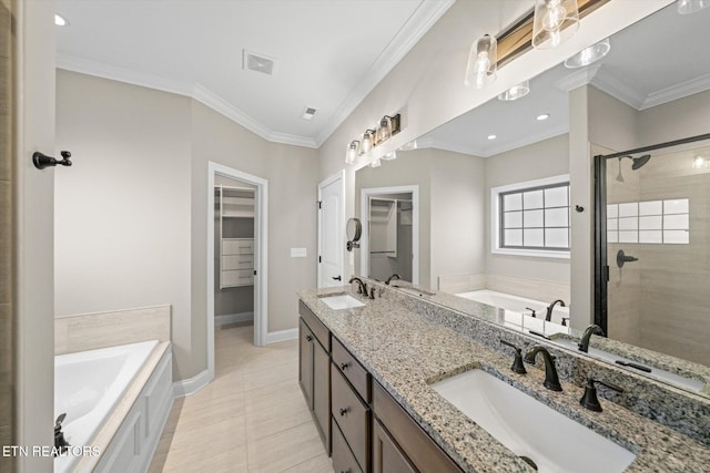 bathroom featuring tile patterned flooring, shower with separate bathtub, vanity, and crown molding