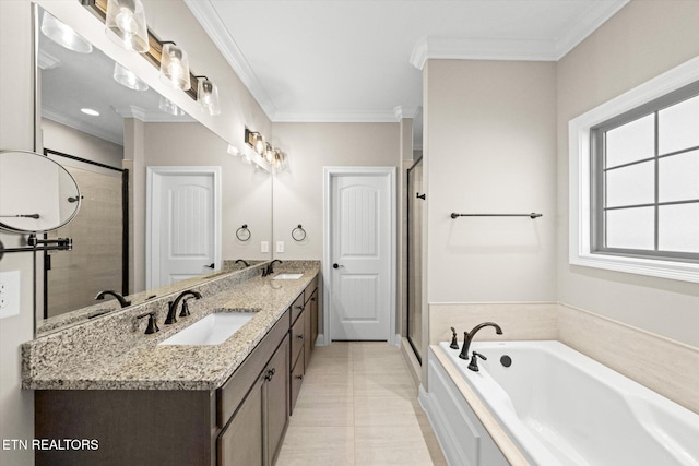 bathroom featuring tile patterned floors, vanity, ornamental molding, and shower with separate bathtub