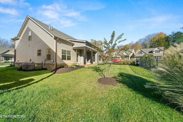 view of home's exterior with a yard