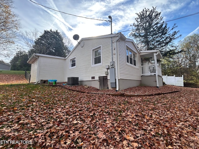 view of side of property featuring cooling unit