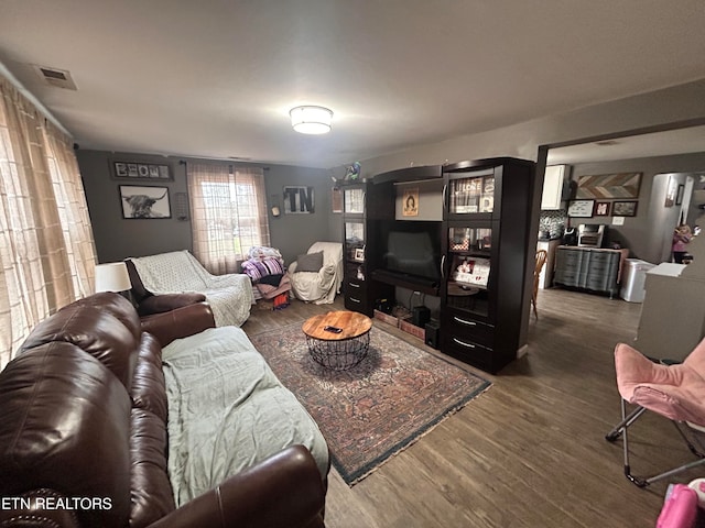 living room featuring dark hardwood / wood-style floors