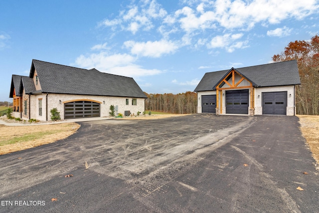 view of side of home with a garage