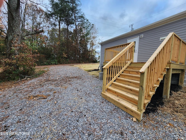 view of yard with a wooden deck