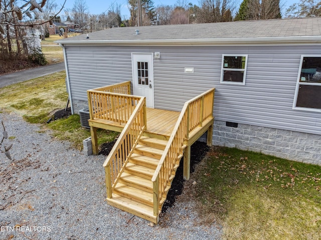 rear view of house with a deck