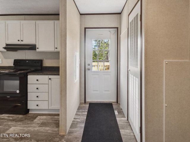 doorway featuring dark hardwood / wood-style floors