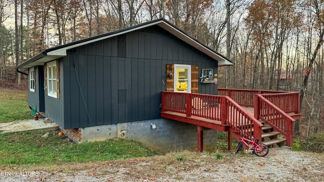 exterior space featuring a wooden deck