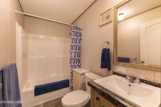 full bathroom featuring shower / tub combo, vanity, a textured ceiling, wood-type flooring, and toilet