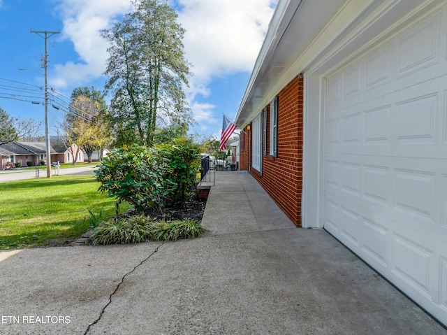 view of property exterior featuring a yard