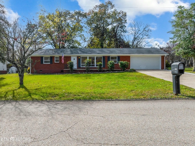 single story home with a front yard and a garage