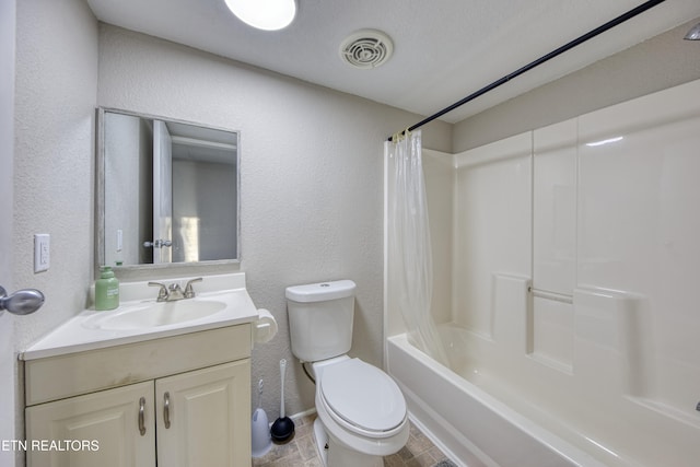 full bathroom featuring a textured ceiling, vanity, toilet, and shower / bathtub combination with curtain