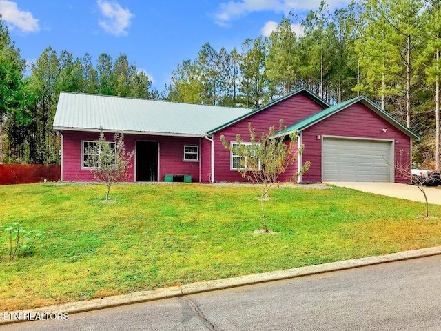 ranch-style house with a front lawn and a garage