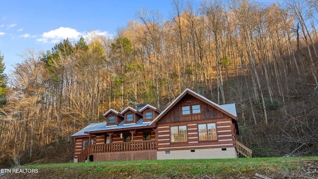 view of log cabin