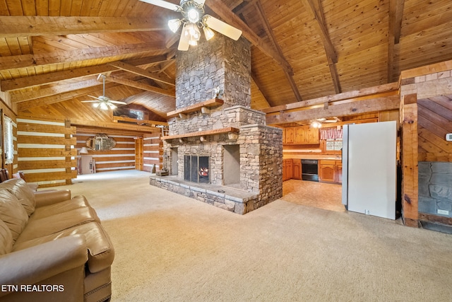 unfurnished living room with beam ceiling, carpet floors, and wood ceiling