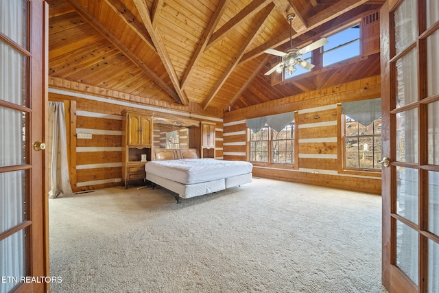 unfurnished bedroom with wood walls, carpet floors, wood ceiling, and multiple windows