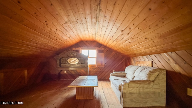 bonus room featuring wood walls, wood ceiling, lofted ceiling, and hardwood / wood-style flooring