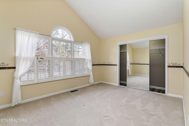 122 Windsor Rd, Crossville, TN 38558 - unfurnished bedroom with carpet floors, high vaulted ceiling, and a closet