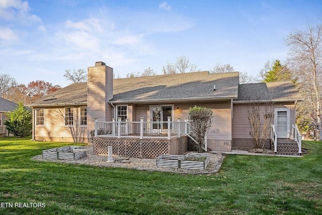 122 Windsor Rd, Crossville, TN 38558 - back of house featuring a deck and a lawn