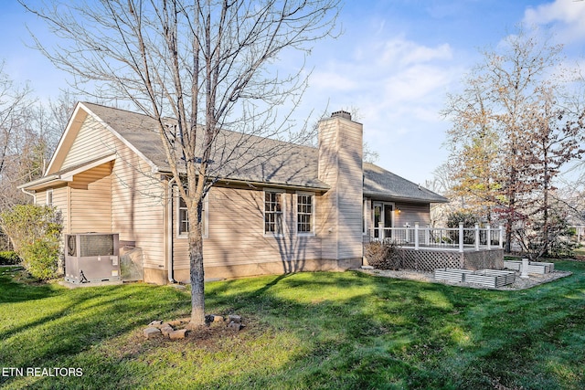 122 Windsor Rd, Crossville, TN 38558 - rear view of property featuring cooling unit, a yard, and a wooden deck