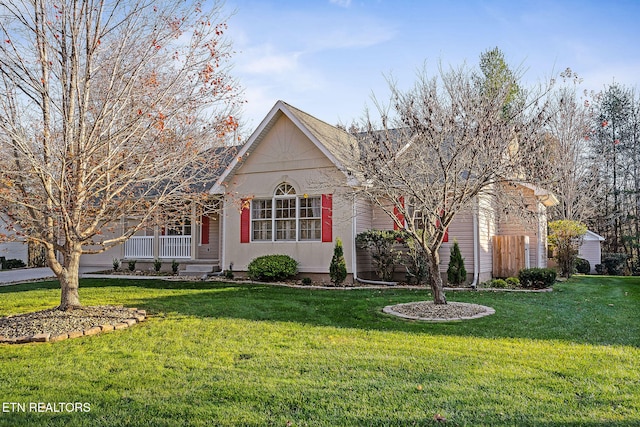 122 Windsor Rd, Crossville, TN 38558 - view of front of house featuring a porch and a front lawn
