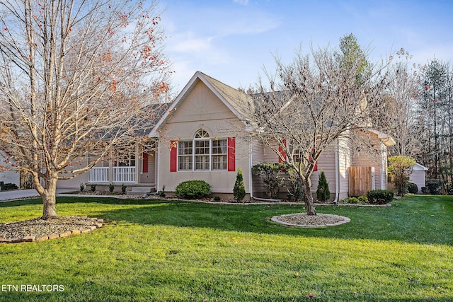 view of front of house featuring a porch and a front lawn