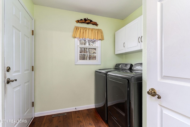 122 Windsor Rd, Crossville, TN 38558 - washroom with dark hardwood / wood-style flooring, cabinets, and washing machine and dryer