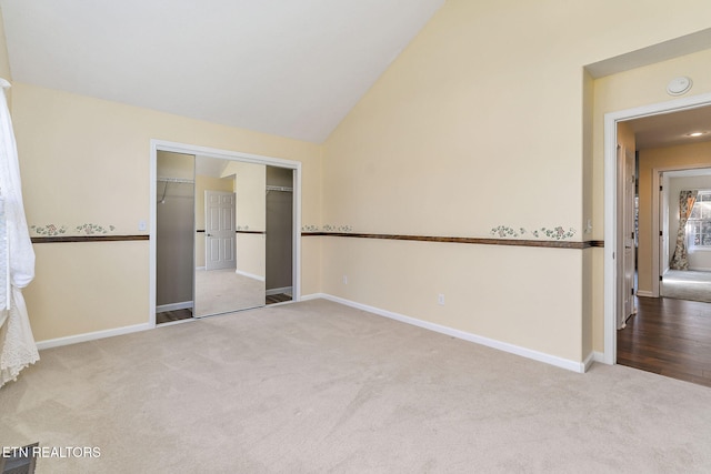 122 Windsor Rd, Crossville, TN 38558 - unfurnished bedroom featuring carpet flooring, vaulted ceiling, and a closet