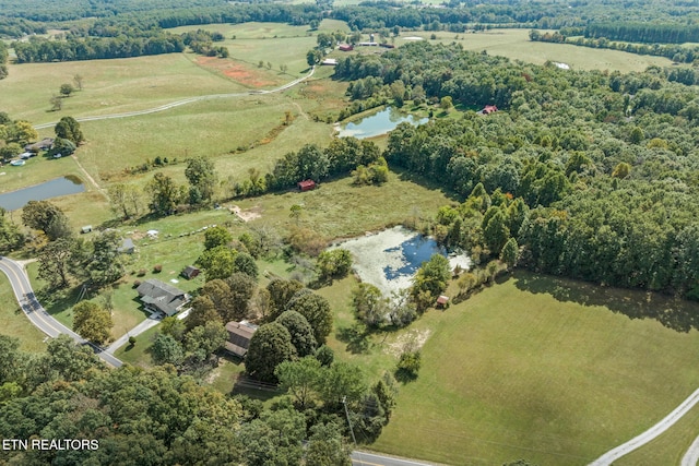 aerial view featuring a rural view and a water view