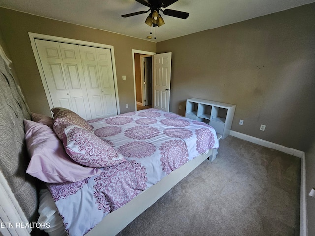 carpeted bedroom with ceiling fan and a closet