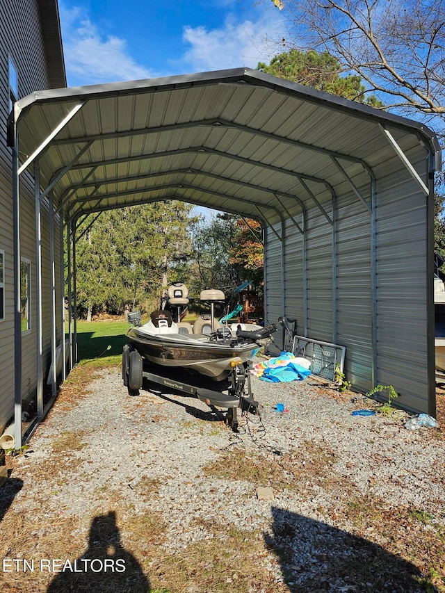 view of parking / parking lot with a carport