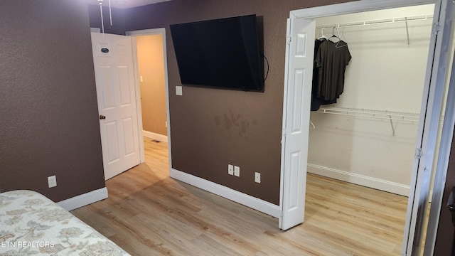 630 Chris Haven Dr, Seymour, TN 37865 - bedroom featuring wood finished floors, baseboards, and a closet