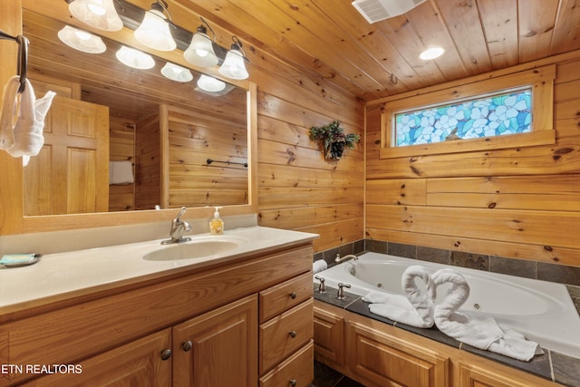 bathroom featuring a bath, vanity, wood ceiling, and wood walls