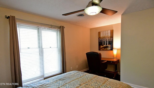 bedroom featuring ceiling fan