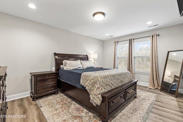 bedroom featuring light hardwood / wood-style flooring