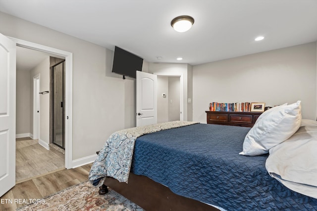 bedroom featuring hardwood / wood-style floors