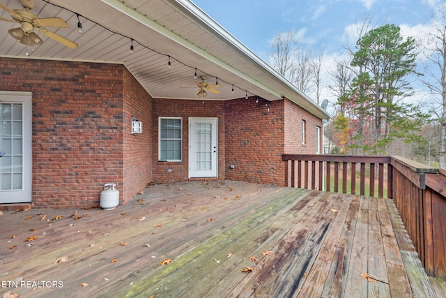 wooden deck with ceiling fan