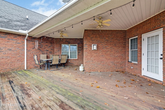 wooden terrace featuring ceiling fan