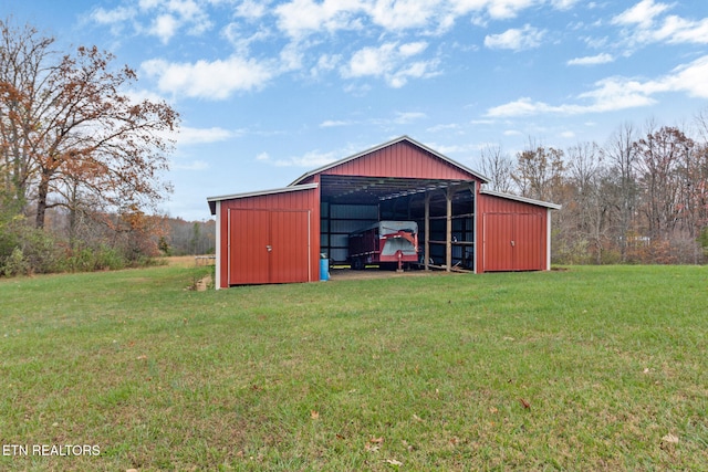 view of outdoor structure with a yard