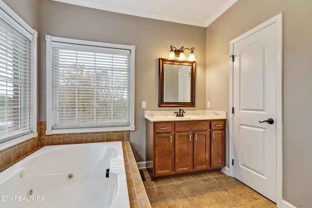 bathroom featuring tile patterned flooring, a relaxing tiled tub, ornamental molding, and vanity