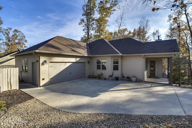 single story home with a garage