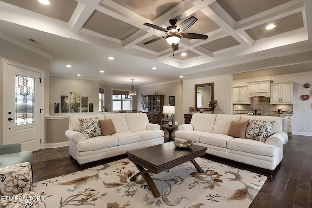 living room featuring beamed ceiling, ornamental molding, coffered ceiling, and dark wood-type flooring