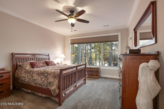 carpeted bedroom with crown molding and ceiling fan