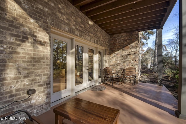 view of patio featuring french doors