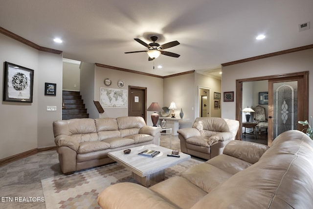 living room featuring ornamental molding and ceiling fan