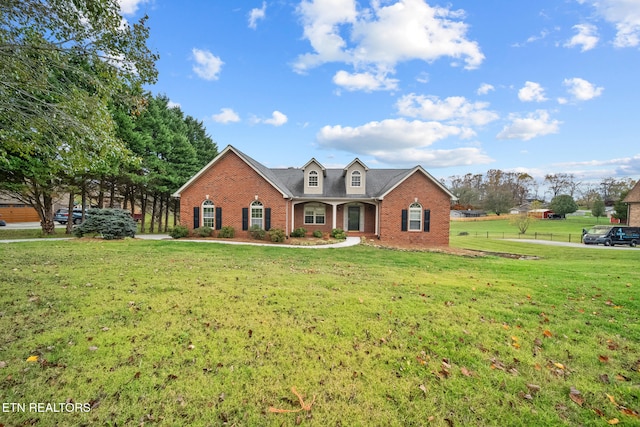 view of front of house with a front lawn