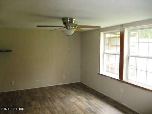 unfurnished room with hardwood / wood-style floors and ceiling fan