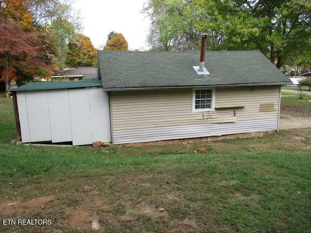 view of property exterior featuring a yard