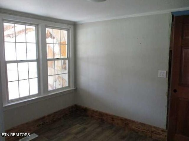 empty room with hardwood / wood-style floors