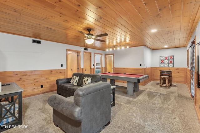 rec room with wooden walls, light colored carpet, wood ceiling, and billiards