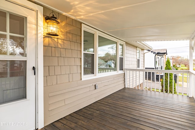 wooden terrace with covered porch