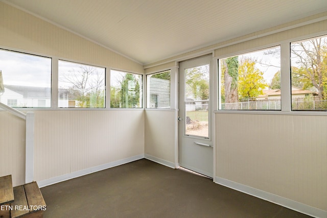 unfurnished sunroom with lofted ceiling and a healthy amount of sunlight